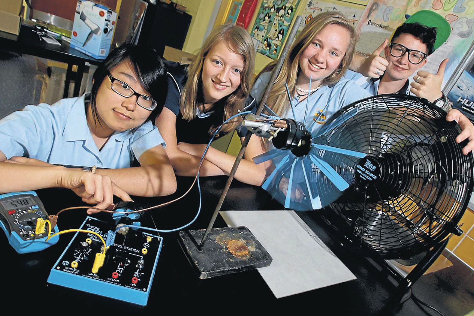 Four Students With Wind Turbine Kits